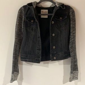Black jean jacket with sweatshirt sleeves